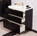 Czarna matowa szafka z trzema szufladami i białą dolomitową umywalką