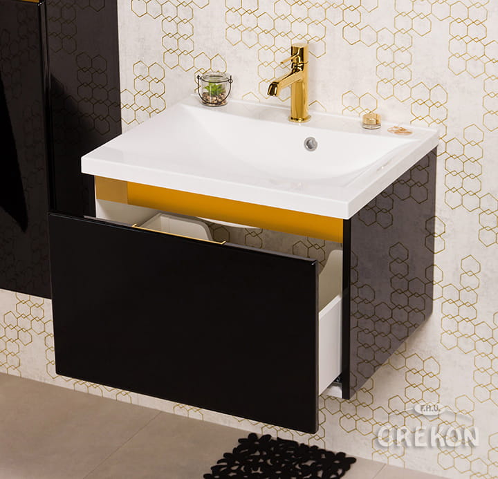 Czarna szafka z eleganckimi złotymi wstawkami i białą dolomitową umywalką