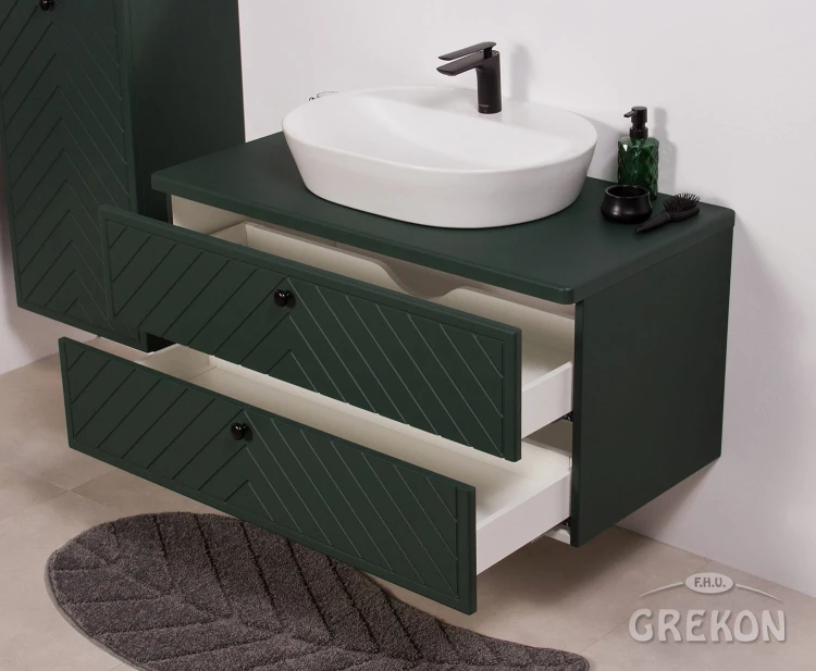 Zielona matowa szafka łazienkowa z ceramiczną umywalką