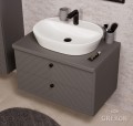 Szafka łazienkowa Kodi oraz biała ceramiczna umywalka