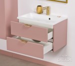 Różowa szafka z białą ceramiczną umywalką