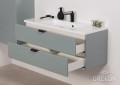 Dwuszufladowa szafka do łazienki z białą umywalką