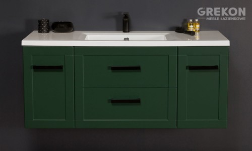 Duża zielona szafka do łazienki z białą umywalką