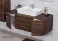 Brązowa matowa szafka do łazienki wraz z białą ceramiczną umywalką