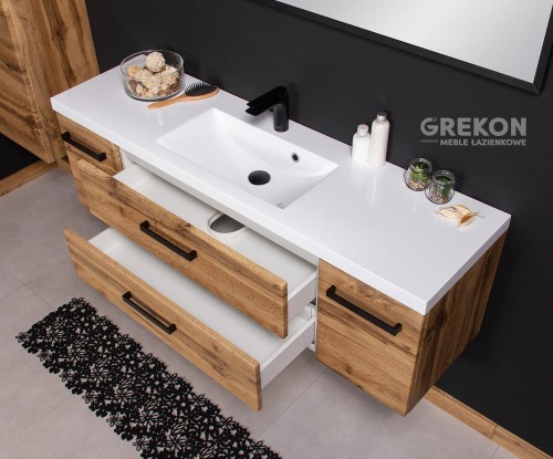 Szafka łazienkowa w kolorze naturalnego dębu z czarnymi uchwytami