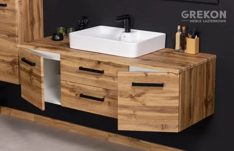 Praktyczna szafka łazienkowa z białą ceramiczną umywalką