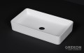 Biała prostokątna ceramiczna umywalka
