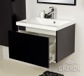 Czarna szafka pod umywalkę z jedną szufladą i białą umywalką